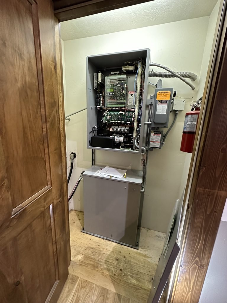 Home elevator controller and hydraulic power unit
