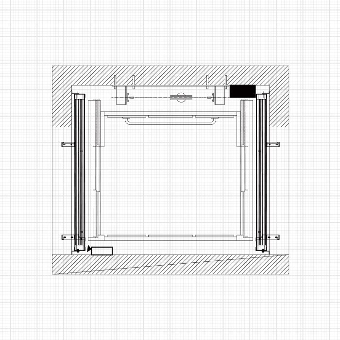 Plan drawing of a residential elevator hoistway showing rails, cab and door